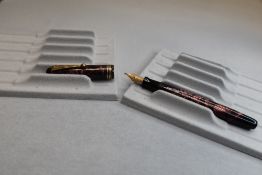 A Parker Televisor Standard in burgundy Striated/hatched with three narrow rings to the cap having