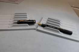 A Burnham The Burnham leverfill fountain pen in black with single band to cap having Burnham 14ct