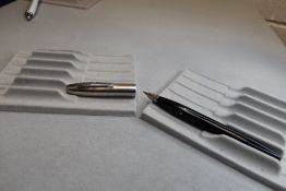 A Sheaffer Imperial III plunger fill fountain pen in black with a steel cap having a Sheaffer nib.