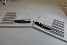 A Parker Latitude plunger fill fountain pen in a bronze finish with Parker nib. Approx 13.7cm