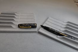 A Burnham 44 leverfill fountain pen in grey marble with single narrow band to cap having Burnham 14k