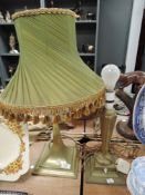 Two vintage brass table lamps,one with green shade.