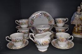 A part tea service by Paragon in the Country Lane design