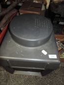 A Belle Howell auto focus slide projector with viewing screen and built in tape deck.
