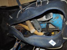 A bag of tool including hammers,files and more.