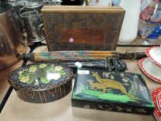 Two vintage cooperative biscuit tins, an early 20th century brass framed telescopic umbrella, a