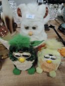 Three retro Furbys.