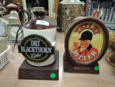 Two collectable pub lights, one for Blackthorn cider the other Tetley bitter.