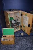 A scientific microscope by Meopta model 209 183 with case and accessories
