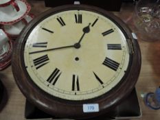 An oak cased wall clock having enamel face and Roman numerals.