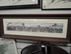 A French print of an early steam train in carved frame