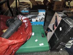 A selection of power tools including heat gun in box and drill.