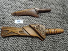 Two antique carved distaffs.