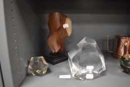 A large crystal of Hadeland glass with similar and a stone sculpture