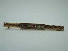 A 9ct gold multi gem 'DEAREST' bar brooch, approx 2.5g