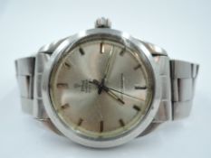 A gent's Tudor Oyster Royal steel wrist watch having baton numeral dial to silvered face to steel