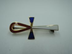 A yellow metal Ankh key of life brooch stamped 12ct having red white and blue enamelled