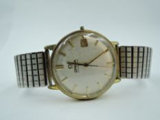 A gent's vintage Omega automatic wrist watch having baton numeral dial with date aperture to