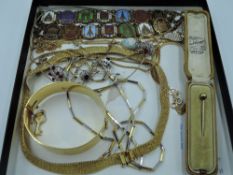 A selection of gold plated costume jewellery including plaited collarette, hinged bangle, dress