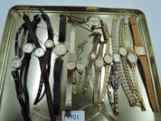 Sixteen lady's wrist watches, most having small faces and gold plated straps, including Rotary,