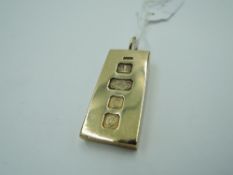 A 9ct gold ingot pendant having oversized 1977 hallmarks, approx 29g
