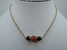 A 9ct gold rope chain necklace with central three bead panel, approx 15' & 13.2g