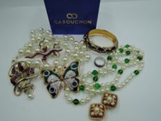 A small selection of 1990's costume jewellery in Cabouchon boxes including enamelled bangle,