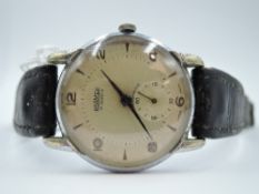 A gent's vintage wrist watch by Roamer having baton & Arabic numeral dial with subsidiary seconds in