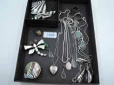 A selection of white metal jewellery, most stamped silver/925 including heart locket, pendants, band