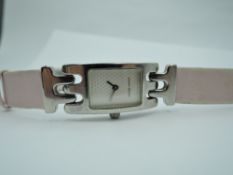 A cased Georg Jensen Edward Kindt Larson watch, model: 376, having rectangular face in steel case