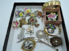A small selection of costume jewellery including ceramic brooches and earrings, rolled gold