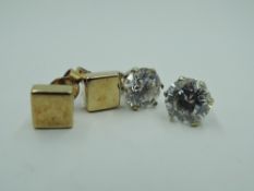Two pairs of yellow metal and 9ct gold stud earrings
