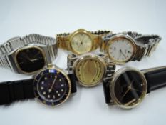 A carved treen box containing six wrist watches including Seiko, Blandford SA etc