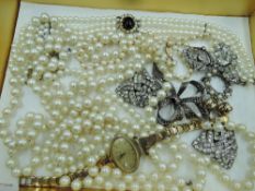 A small selection of costume jewellery including Tissot wrist watch, simulated pearls with silver