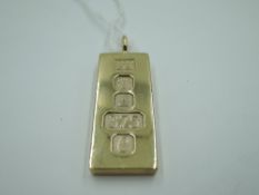 A 9ct gold ingot pendant bearing oversized hallmarks for 1977, approx 30g