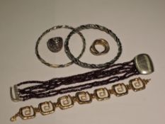 Six pieces of HM silver and white metal jewellery testing as silver/stamped 925, including two slave