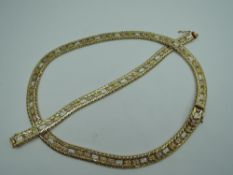 A multi coloured gold plated woven collarette and matching bracelet, stamped 925