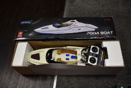 A Shuang Ma 7004 remote controlled racing boat