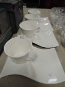 Four Villeroy and Boch tennis sets/cups and saucers.