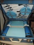 A mid century Sirram picnic set in blue,
