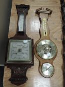 Two vintage wall mounted barometers, one having carved detail by Fowler and Oldfield of Bradford.AF