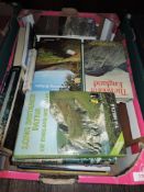 A box of mixed interest books including walking and exploring interest.
