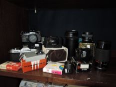A selection of photographic cameras and equipment including Mitakon zoom and Yashica lens