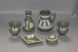 A selection of Jasper wares by Wedgwood in a sage green ground