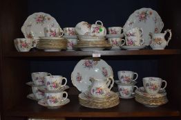 A large part tea and dinner service by Royal Crown Derby in the Derby Posies design