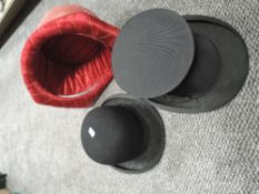 A vintage Bowler hat and similar collapsible top hat