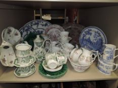 A good collection of mixed ceramics including platters,cups and saucers, coffee pots and more also