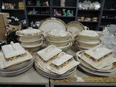 A good quantity of Ivory tureens,plates,cheese dishes and similar having floral transfer pattern