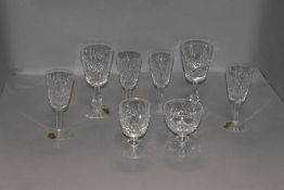 A selection of clear cut crystal glasses by Waterford in various designs