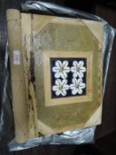 A collage style book binding having shell decoration